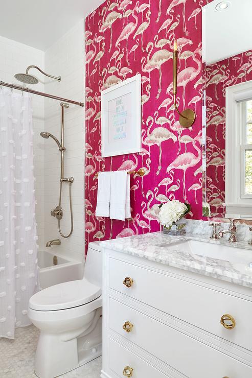 hot pink girls bathroom with white pom pom shower curtain