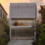 bondi house dusk facade steel doors 1
